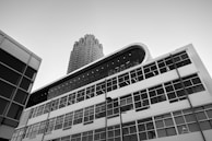 Black and white urban scene highlighting architectural details and textures.