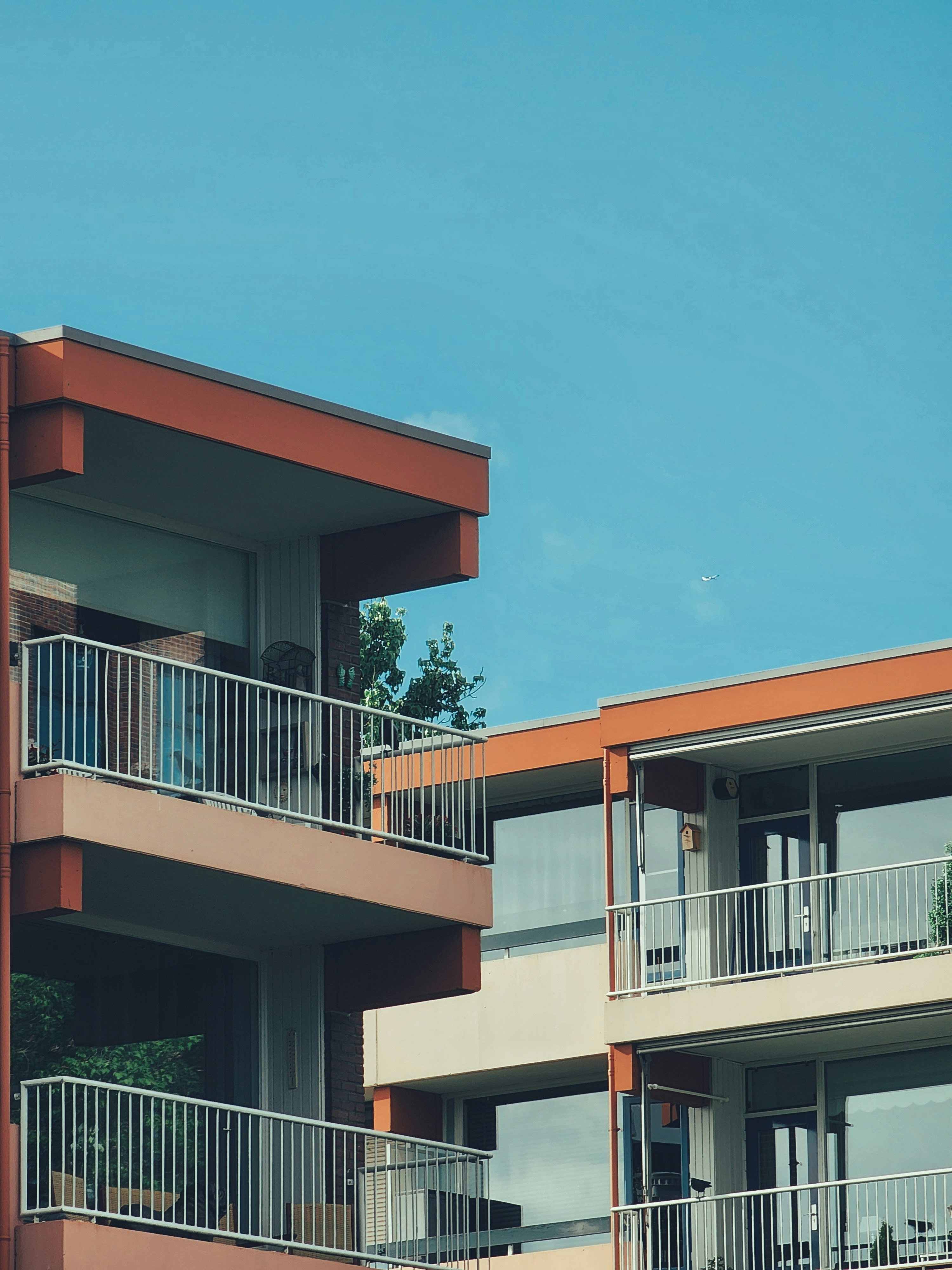 an apartment building with balconies and balconies on the balconies