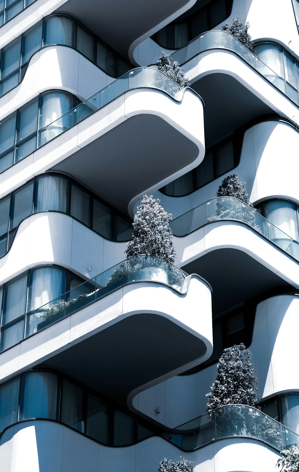 a tall building with balconies and balconies on it