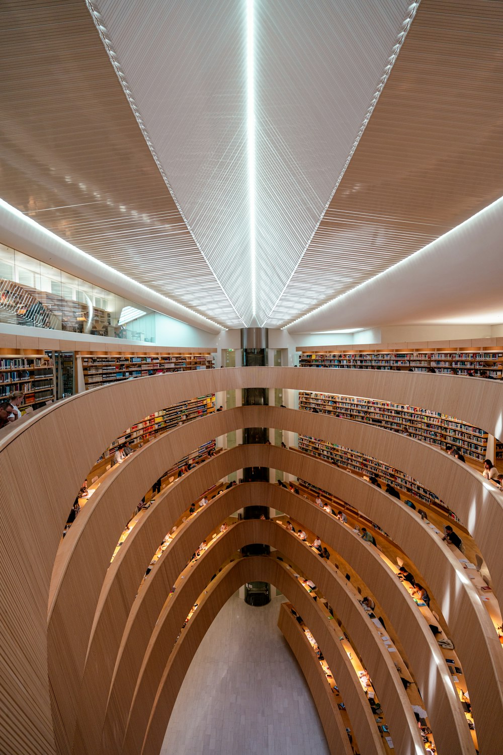 the interior of a large library filled with lots of books