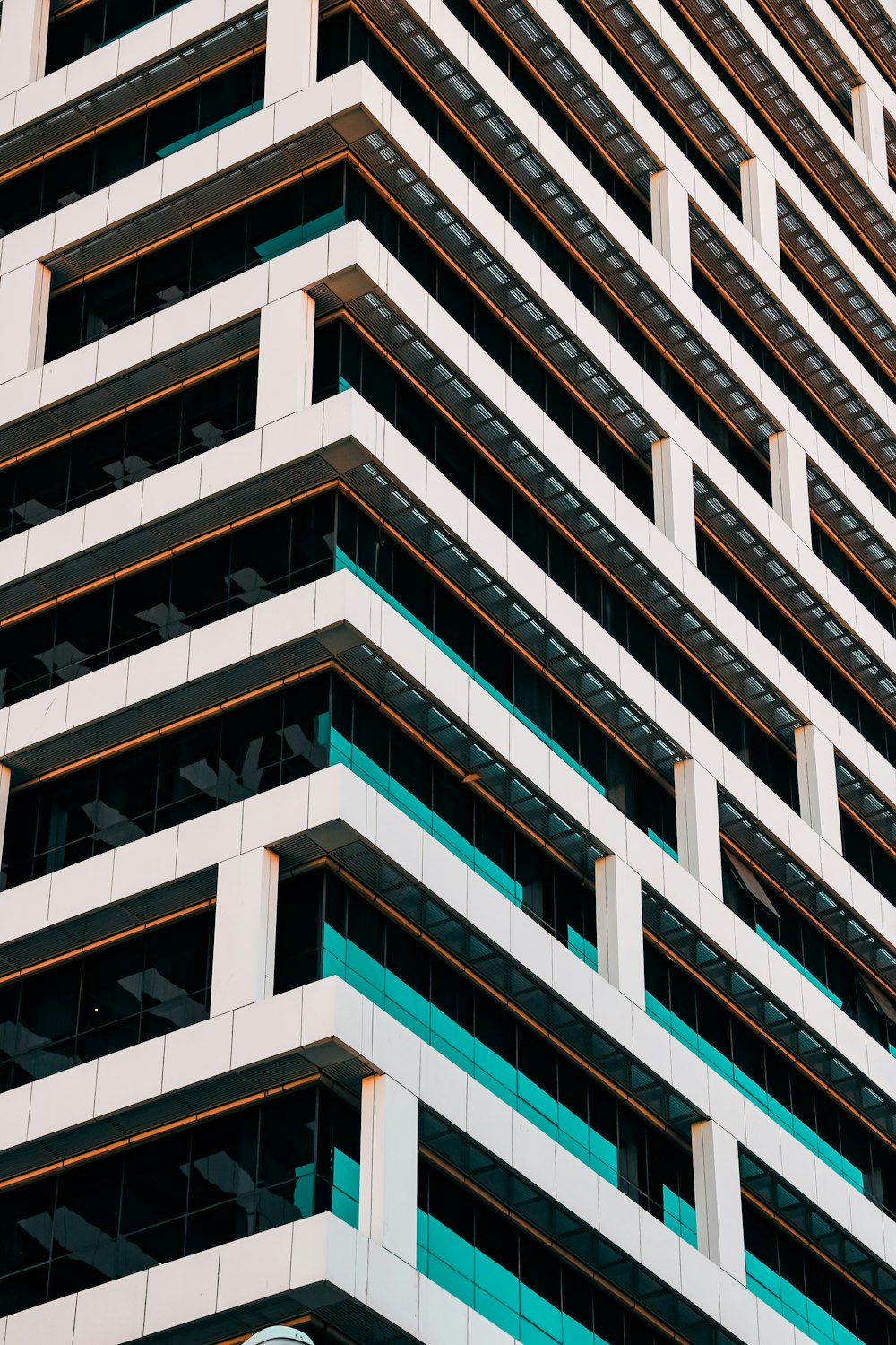 a tall building with a clock on the side of it