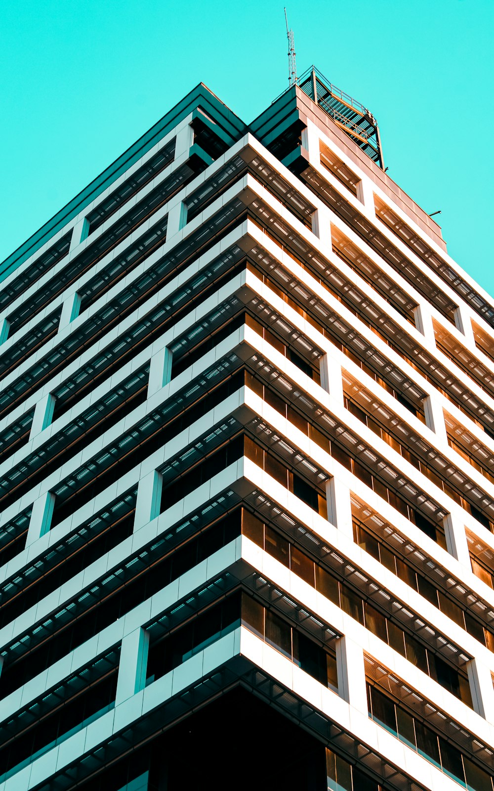 a tall building with a clock on the top of it