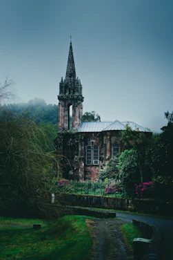 an old building with a steeple in the background