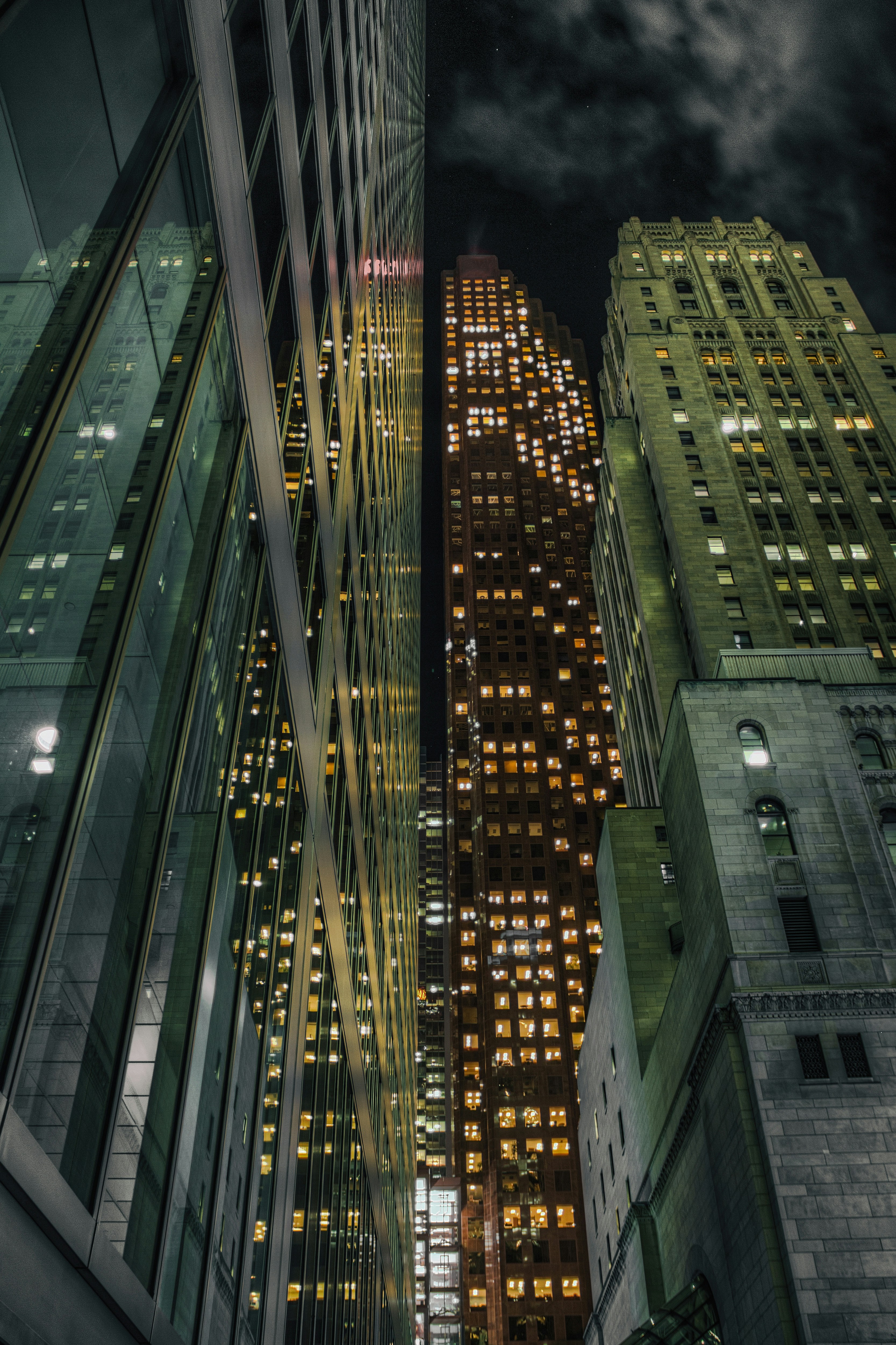 a view of a city at night from the ground