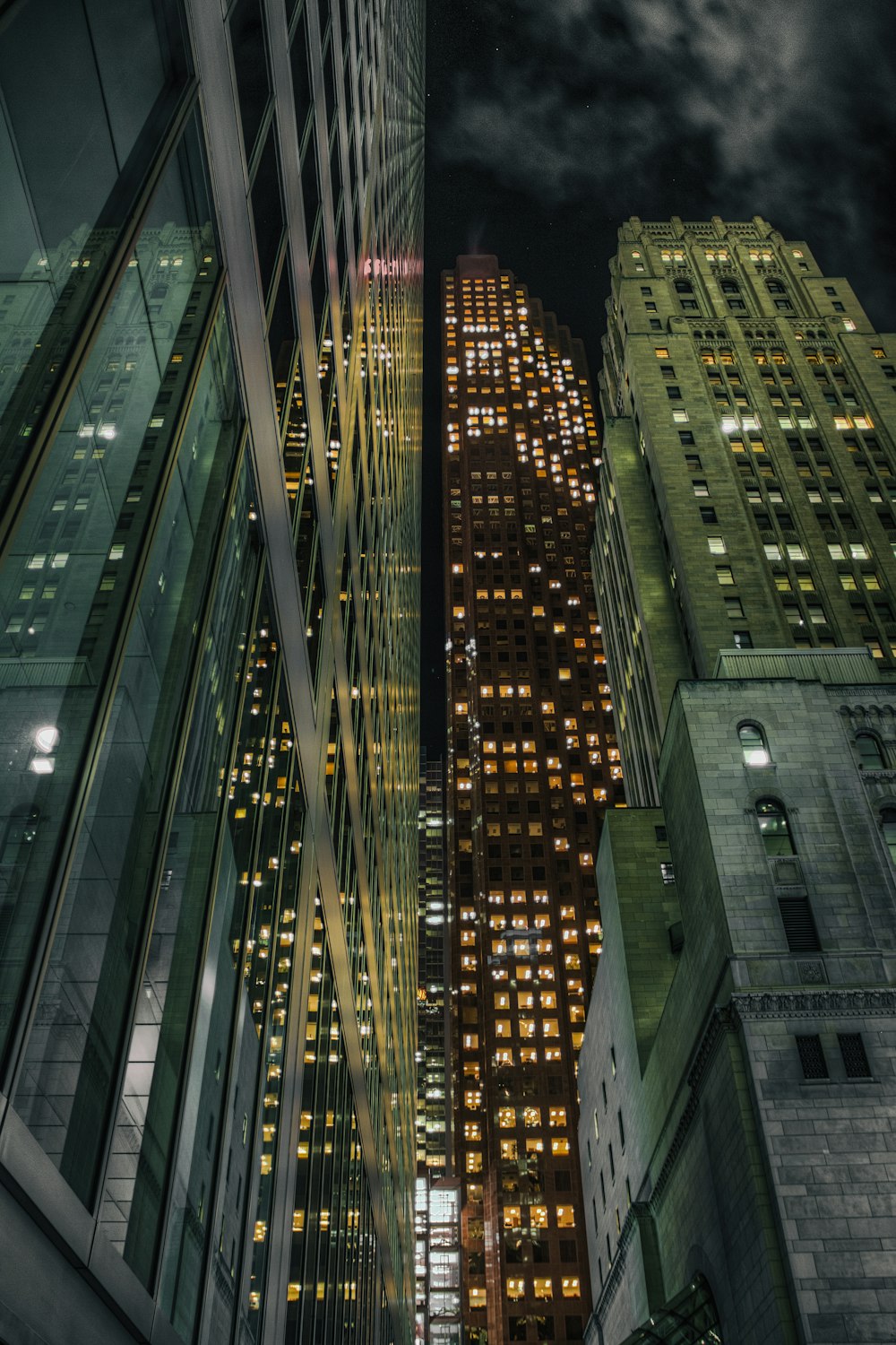 a view of a city at night from the ground