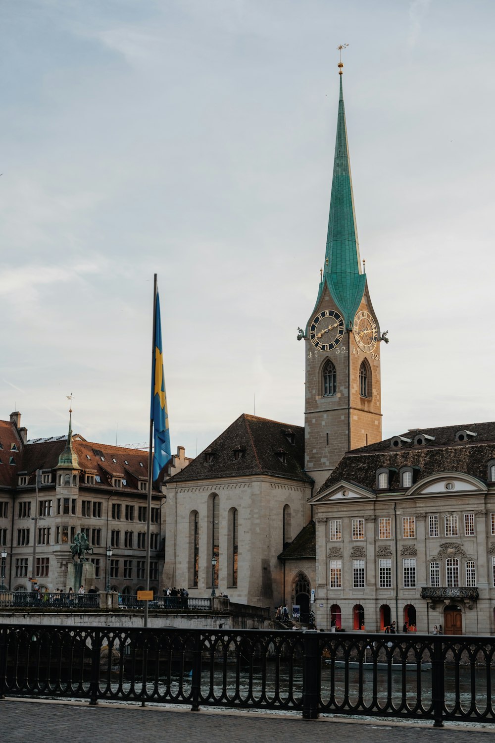 a large building with a green steeple on top of it