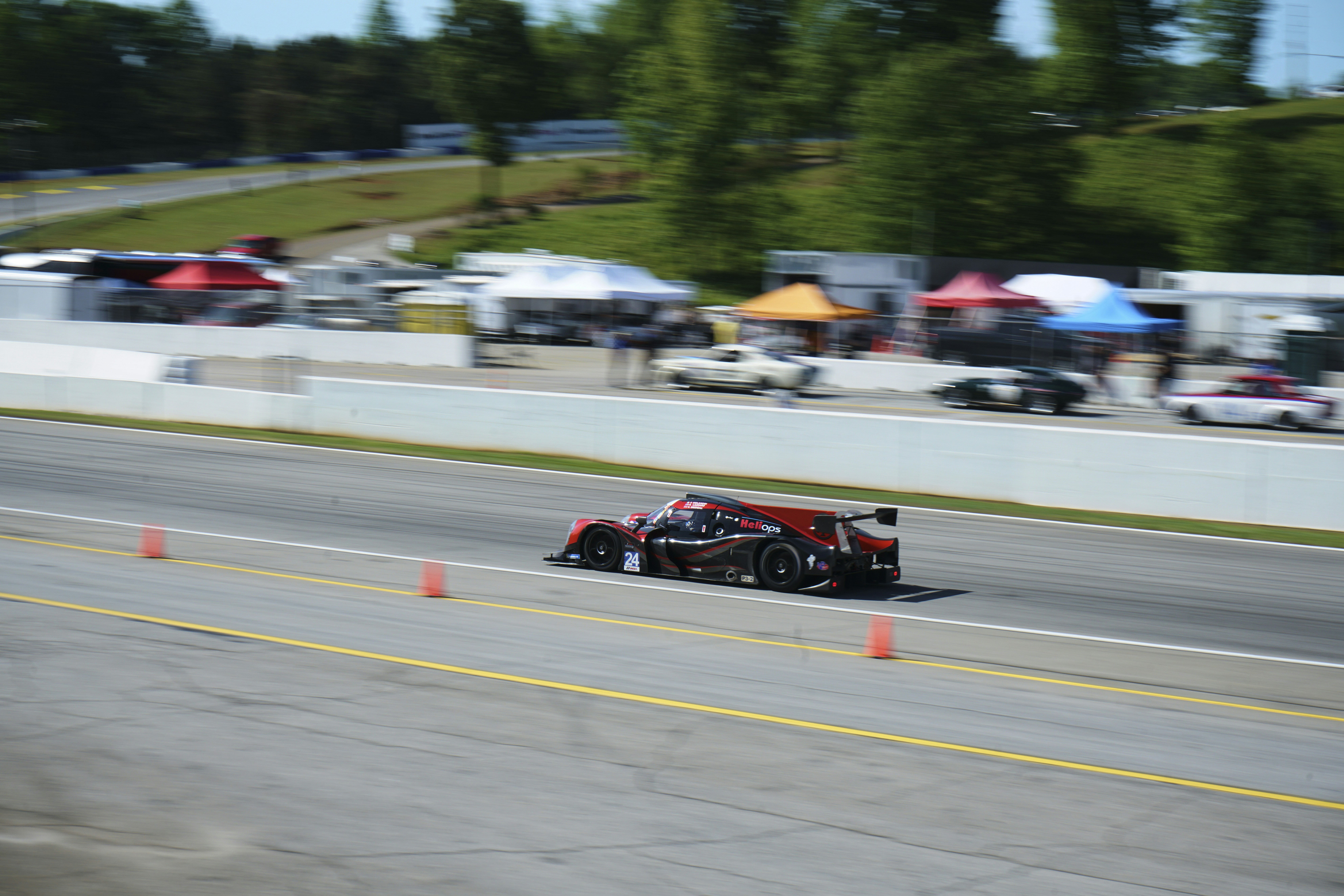 A race car driving down a race track photo Free Road atlanta Image on