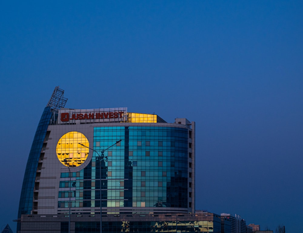 a tall building with a clock on the side of it