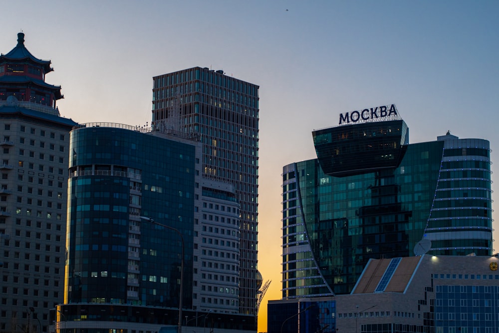 a group of tall buildings sitting next to each other