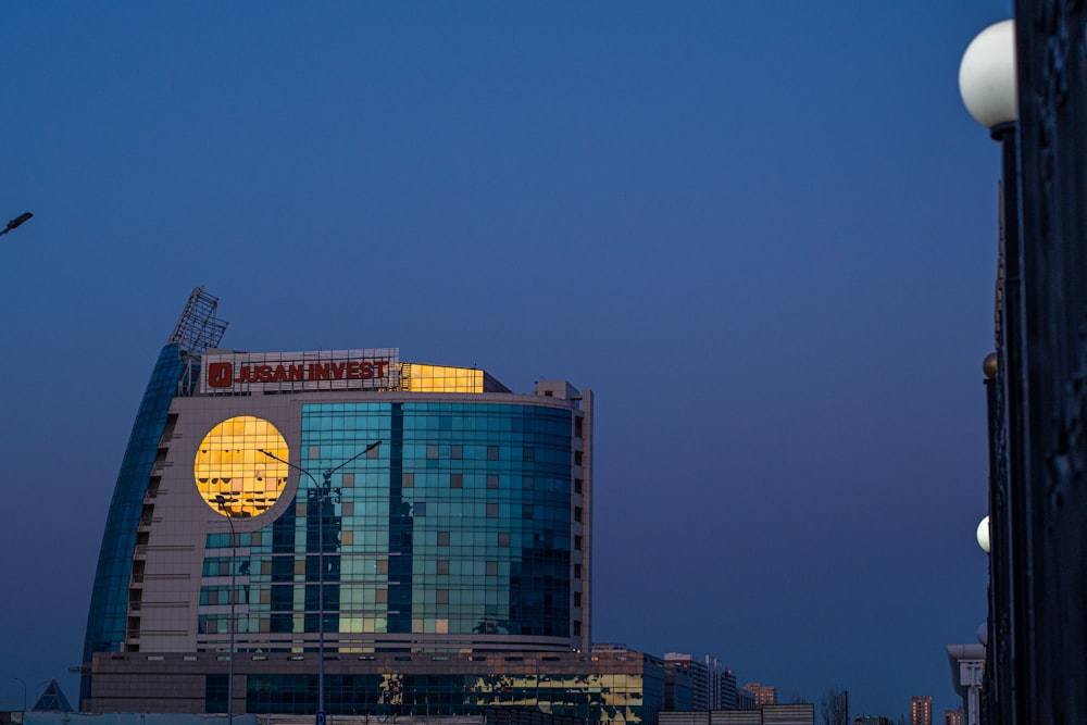 a tall building with a clock on the side of it