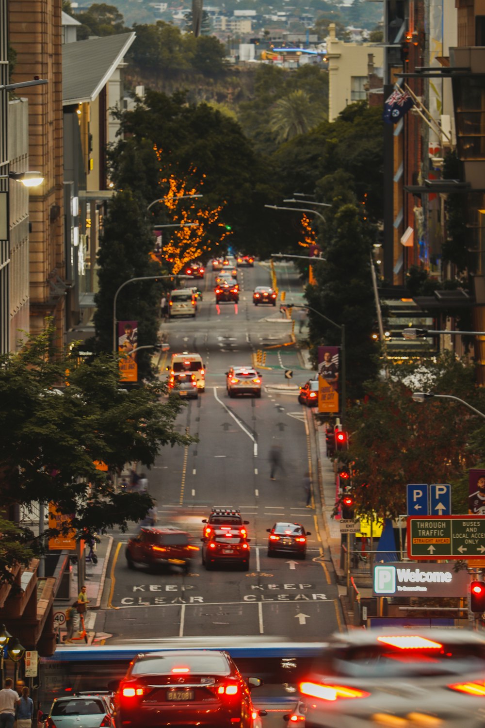 a city street filled with lots of traffic