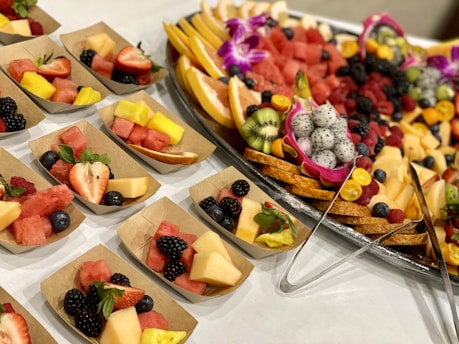 a table topped with lots of different types of fruit