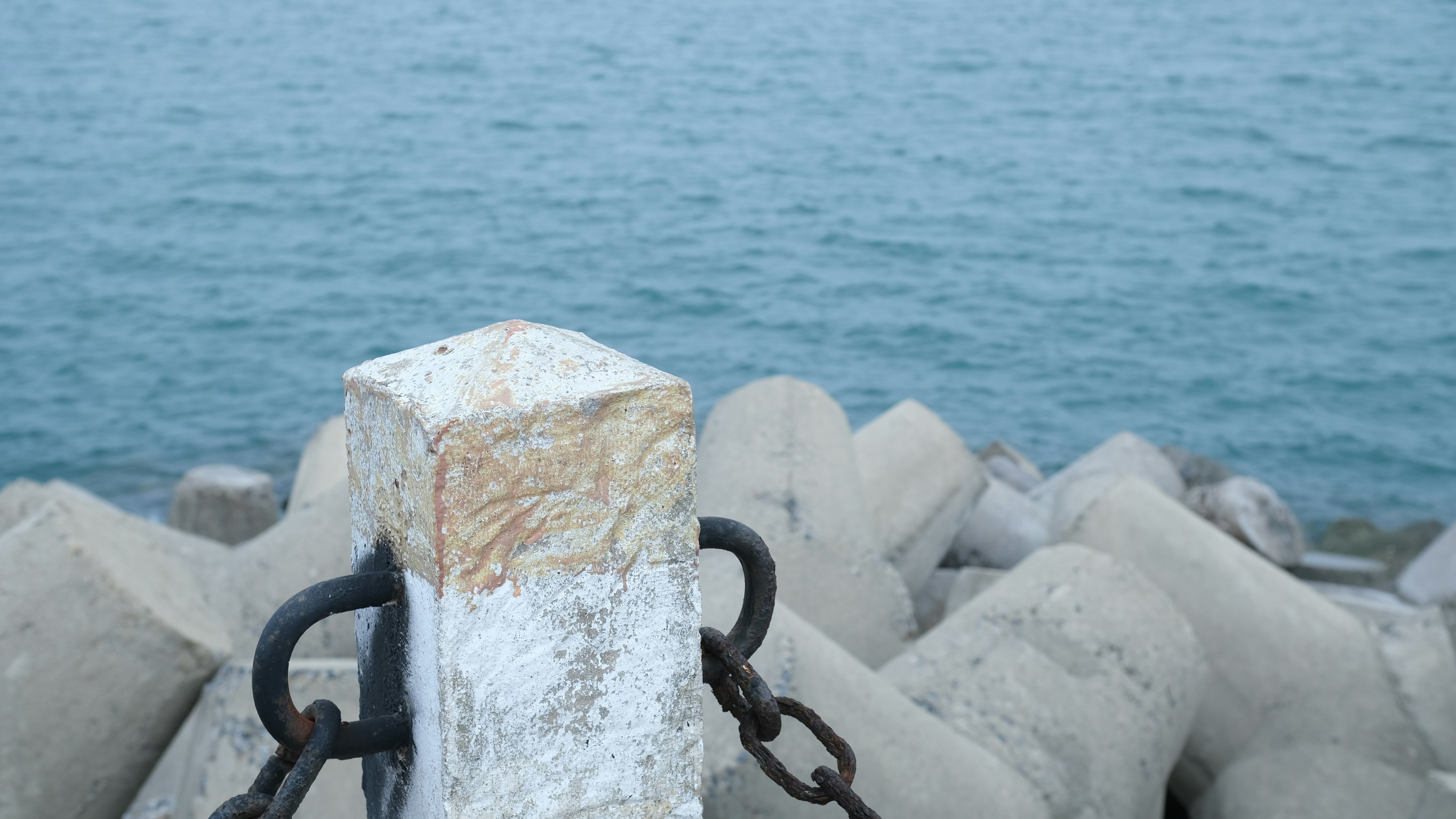 a stone block with a chain attached to it