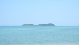 A serene view of St. Thomas with clear blue waters.