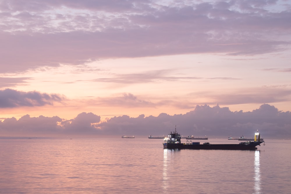 a large boat floating on top of a large body of water