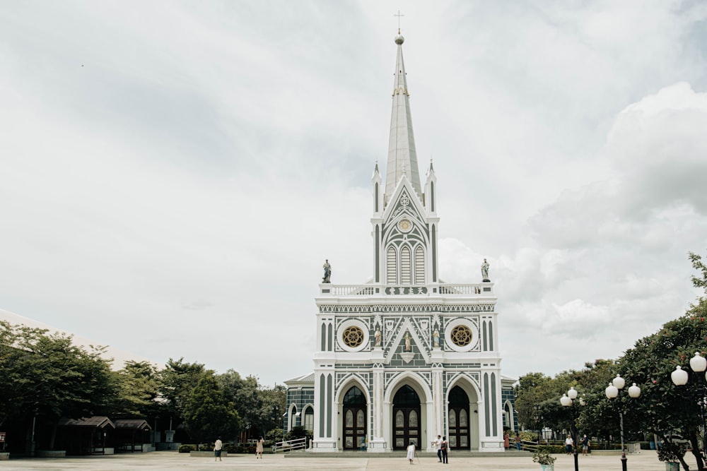 a large white church with a clock tower