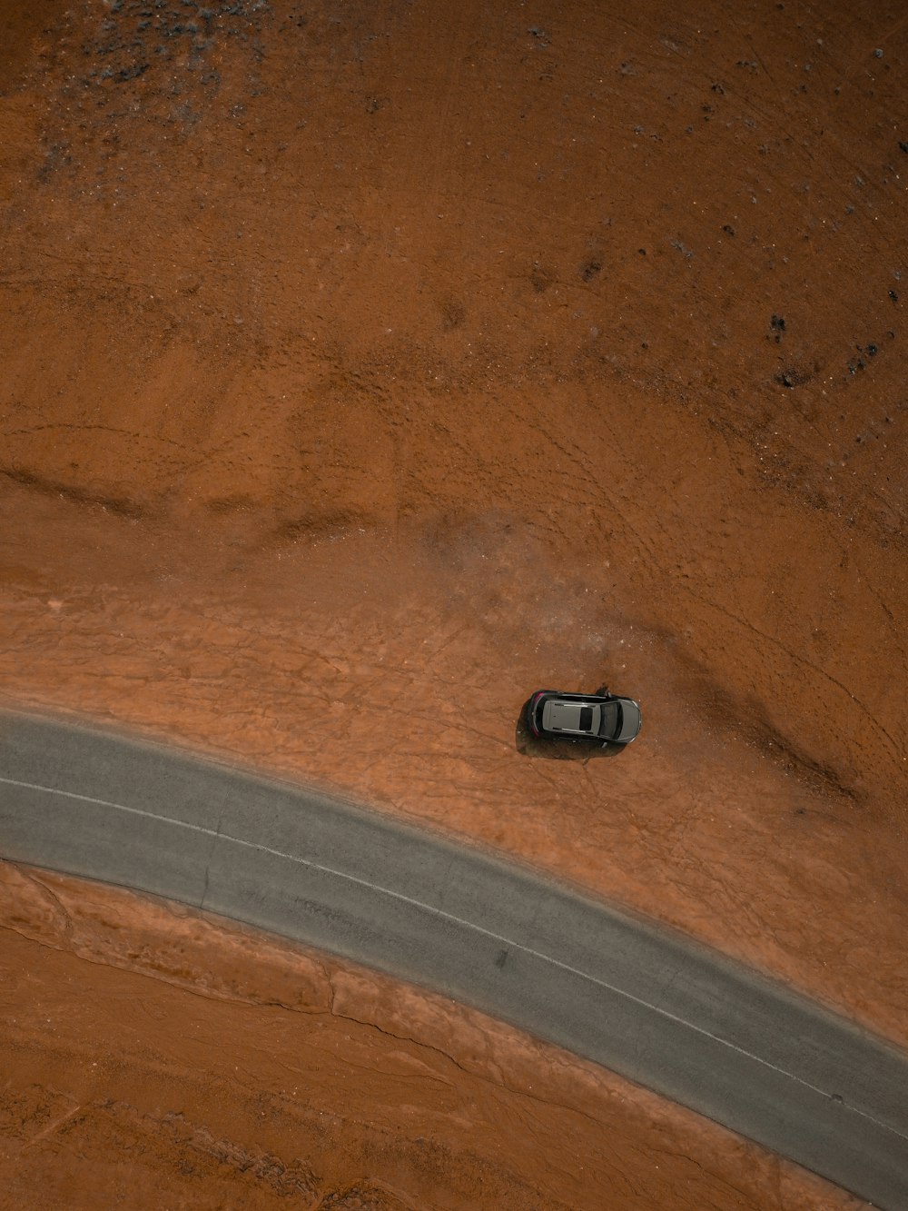 a car is parked on the side of a road