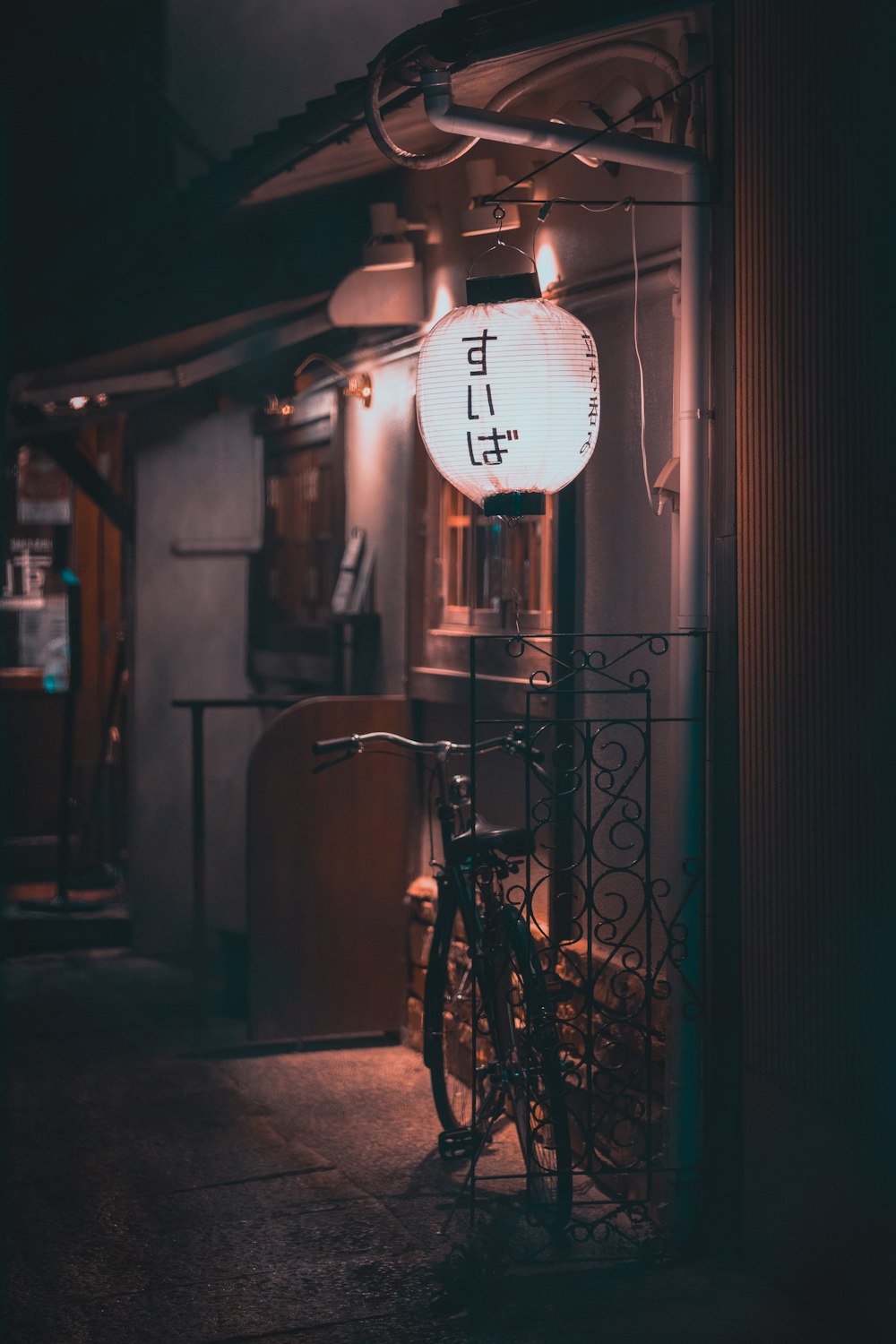 a bicycle is parked outside of a building