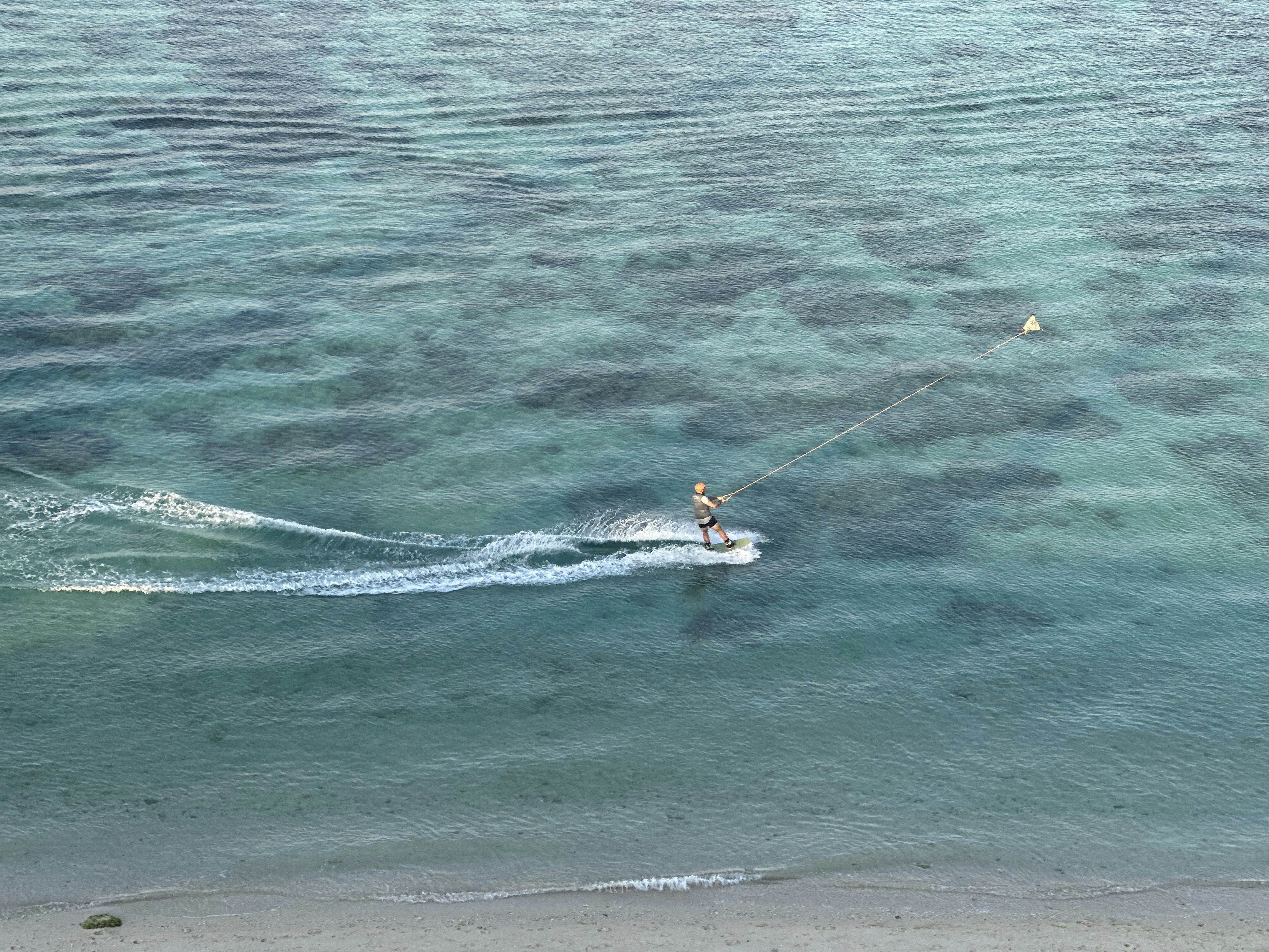 a person on a surfboard in the water