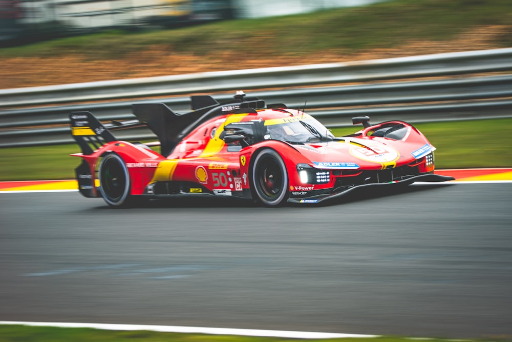 a racing car driving down a race track