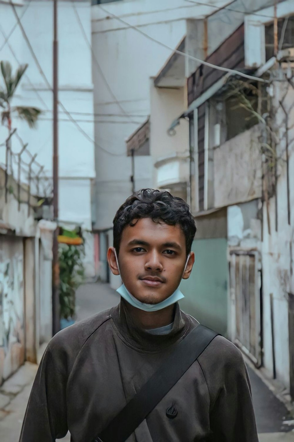 a man standing in the middle of a street