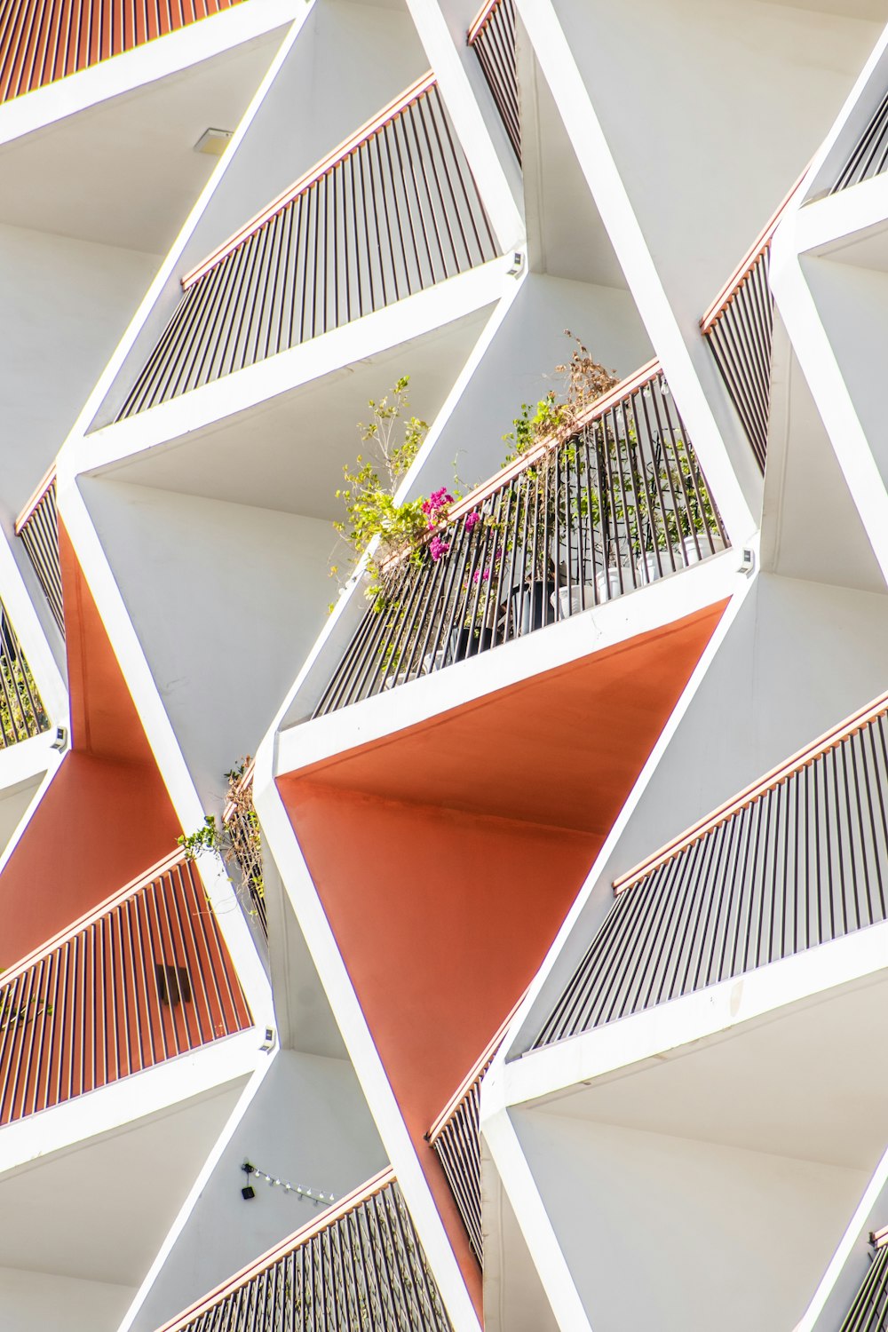 a building that has a bunch of balconies on it