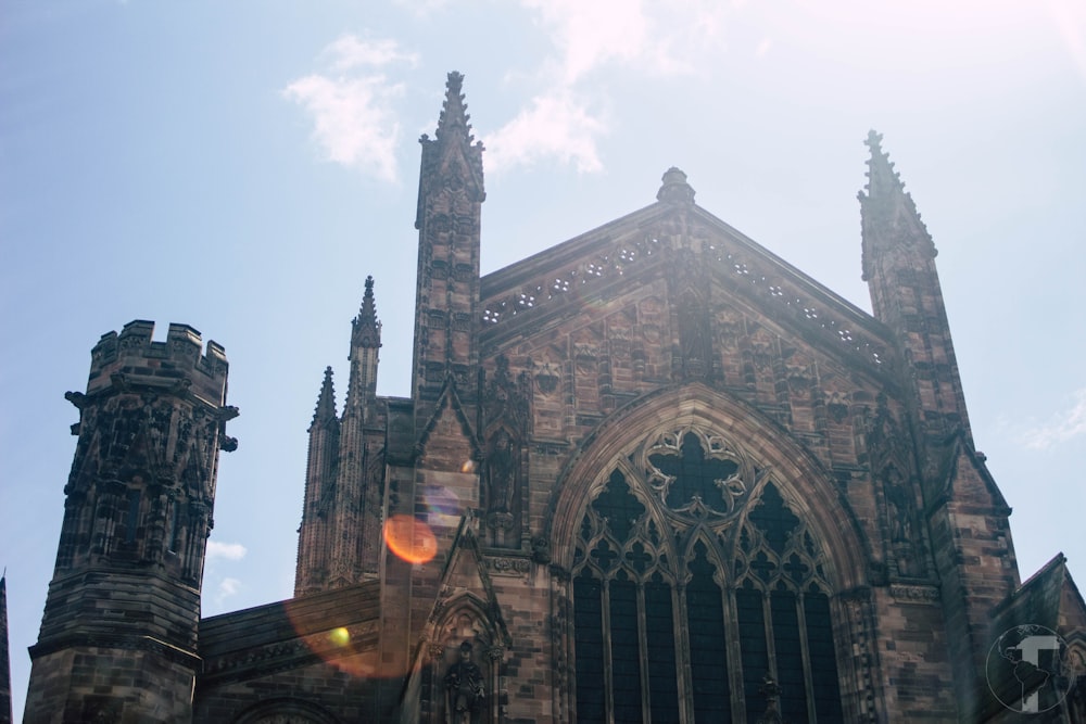 the sun is shining through the windows of an old church