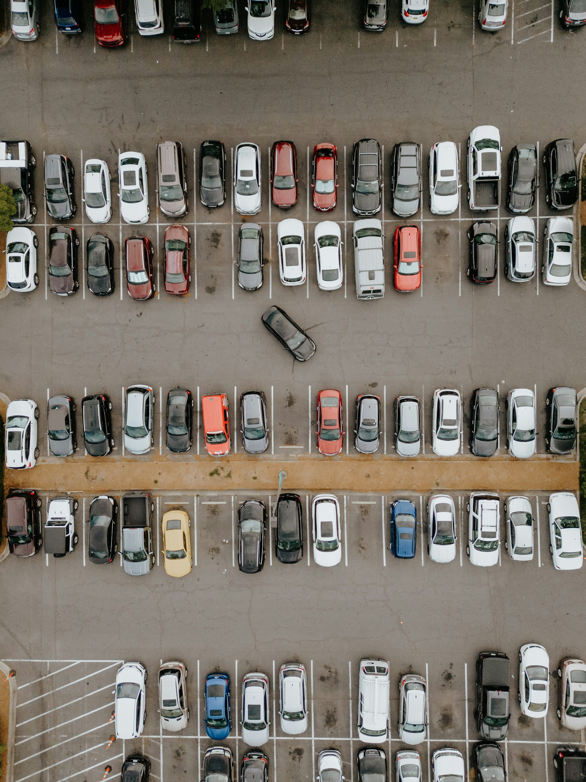 woman wearing yellow long-sleeved dress under white clouds and blue sky during daytime