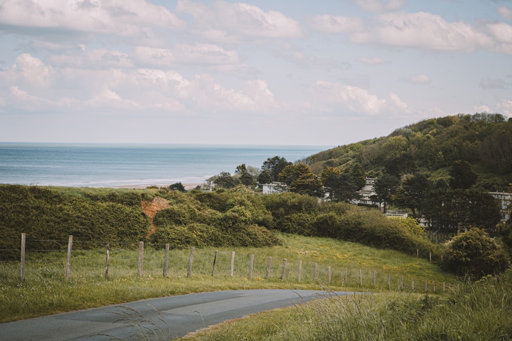 a view of the ocean from a hill top