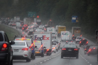 A truck delivering goods on a busy highway.