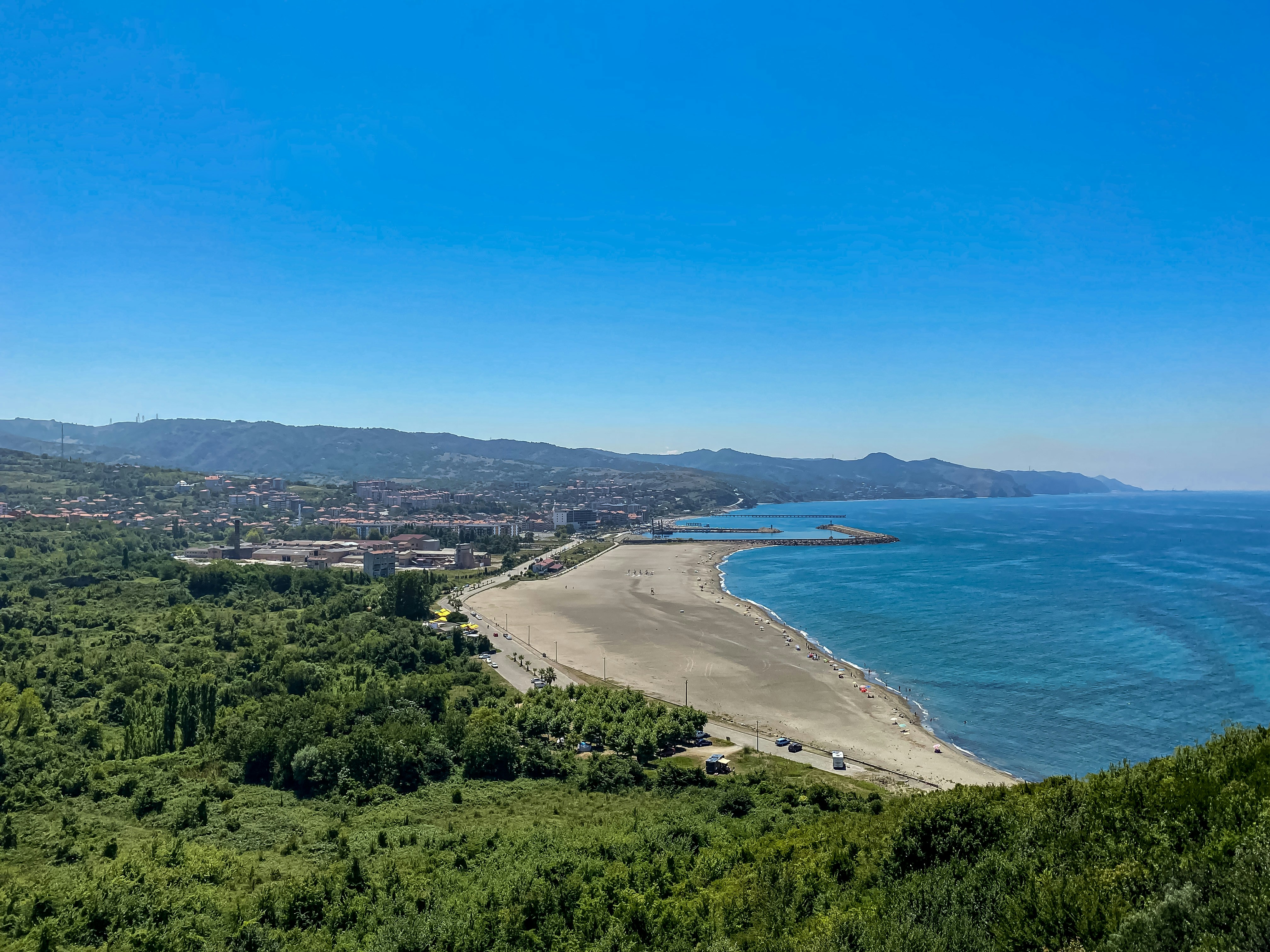 a view of a beach from a hill