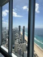 Dynamic real estate video still capturing a panoramic view of a coastal property.