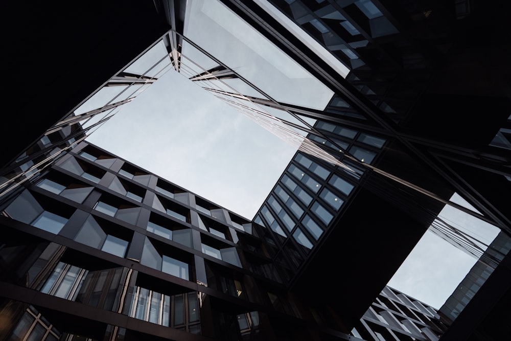 looking up at a tall building from the ground