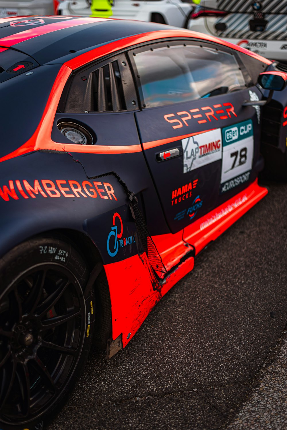 a race car parked on the side of the road