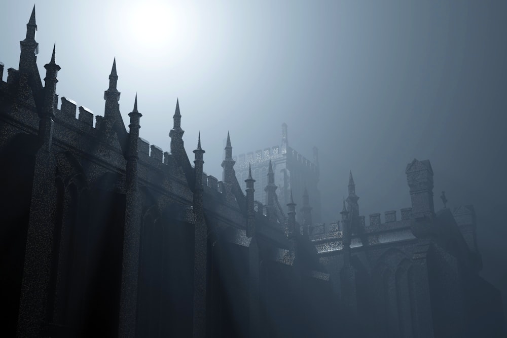 a foggy castle with a clock tower in the distance