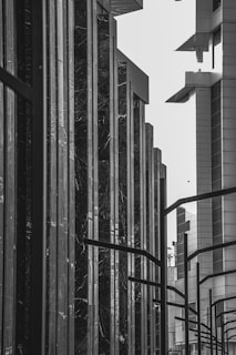 A monochrome photo of a cityscape emphasizing sharp lines and geometry.