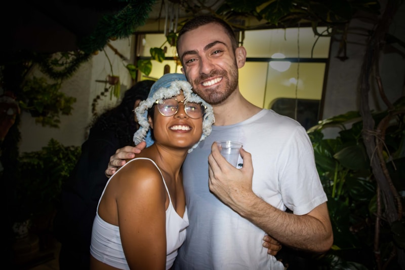 a man and a woman pose for a picture