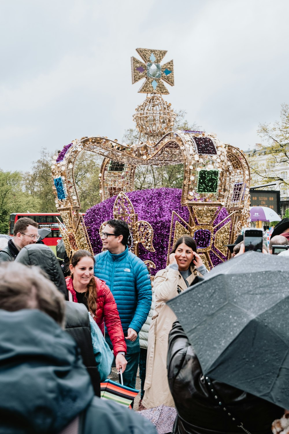 a group of people standing in front of a float