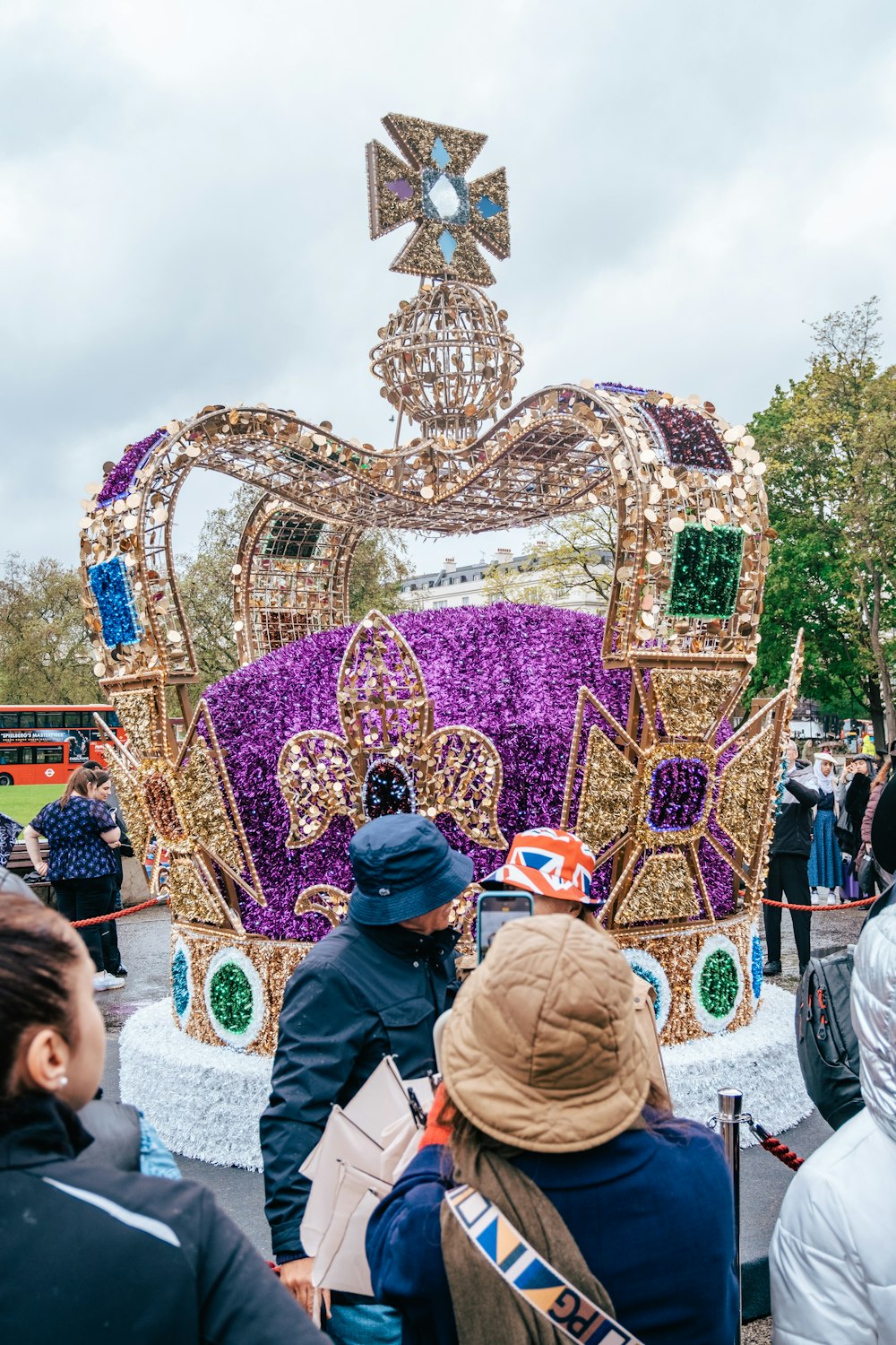 a group of people standing in front of a float