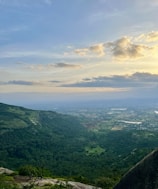A panoramic skyline view from the property showcasing the rolling hills of Wayanad.