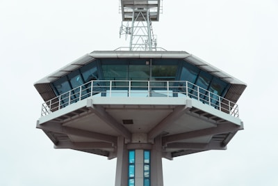 a tall tower with a clock on the top of it