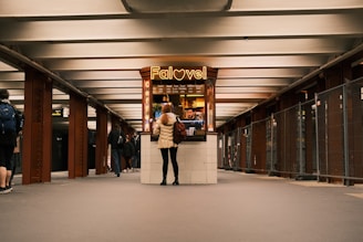 A vibrant food trailer serving fresh falafel in a bustling city setting.