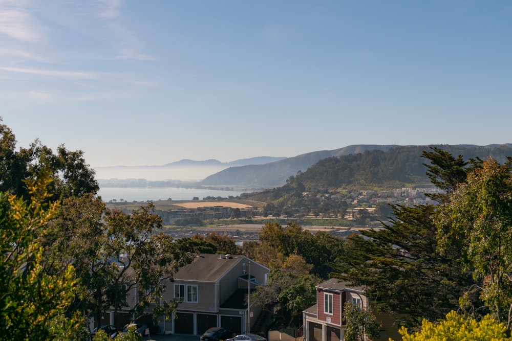 a view of a town with mountains in the background