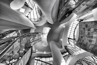 A panoramic view of a luxury renovation project showcasing smooth curves and refined textures.