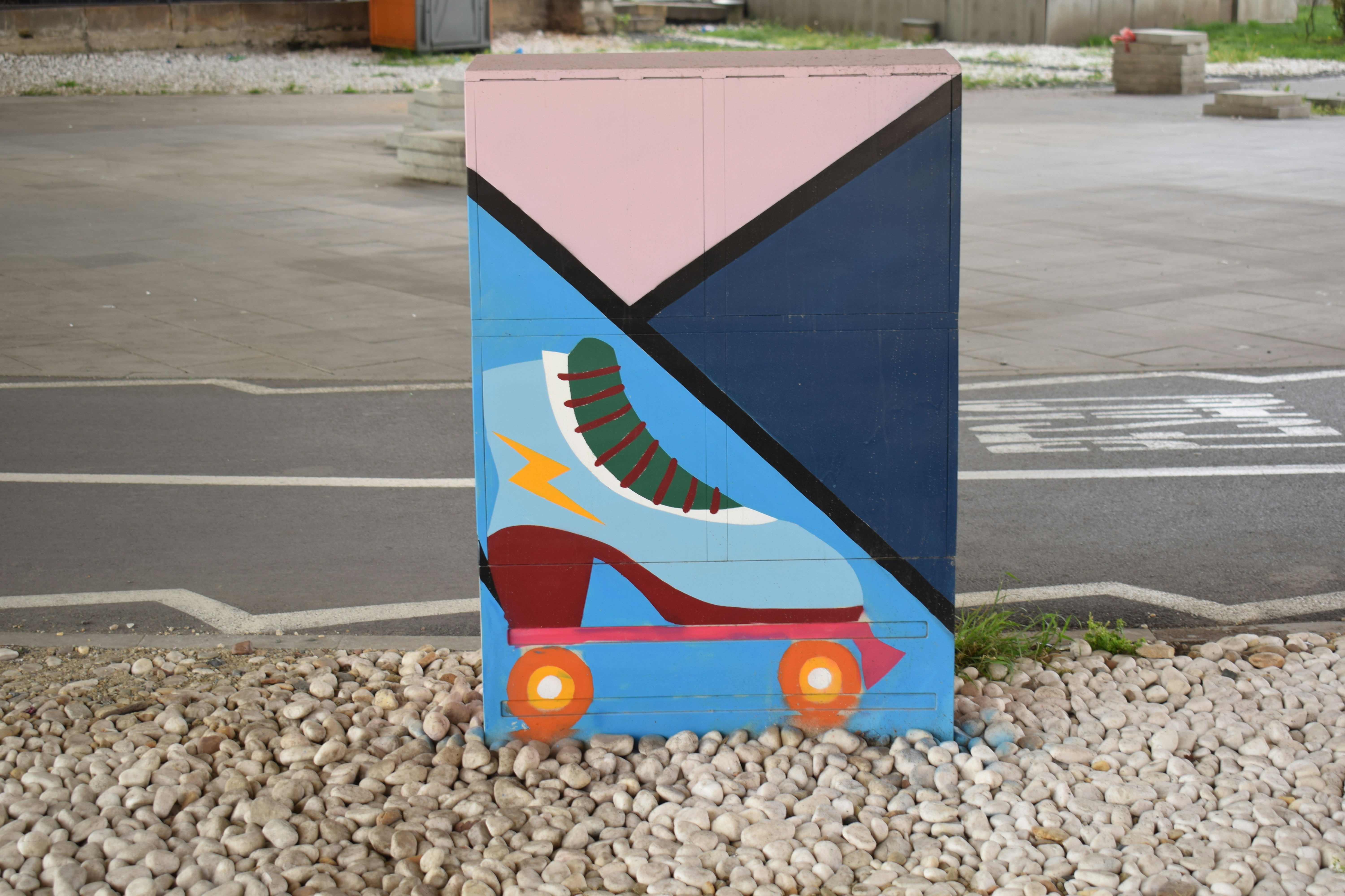 a painted box with a roller skate on it