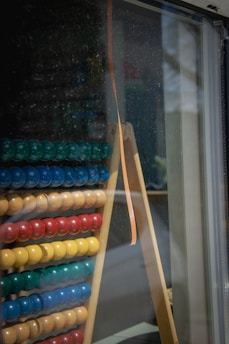 Children happily engaged in an abacus class, concentrating on their beads.