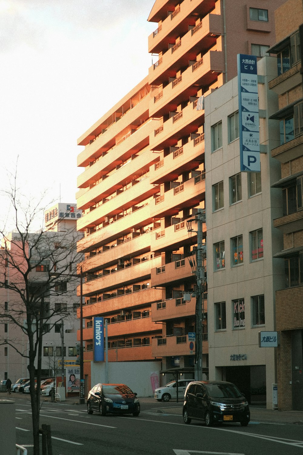 a city street filled with lots of tall buildings