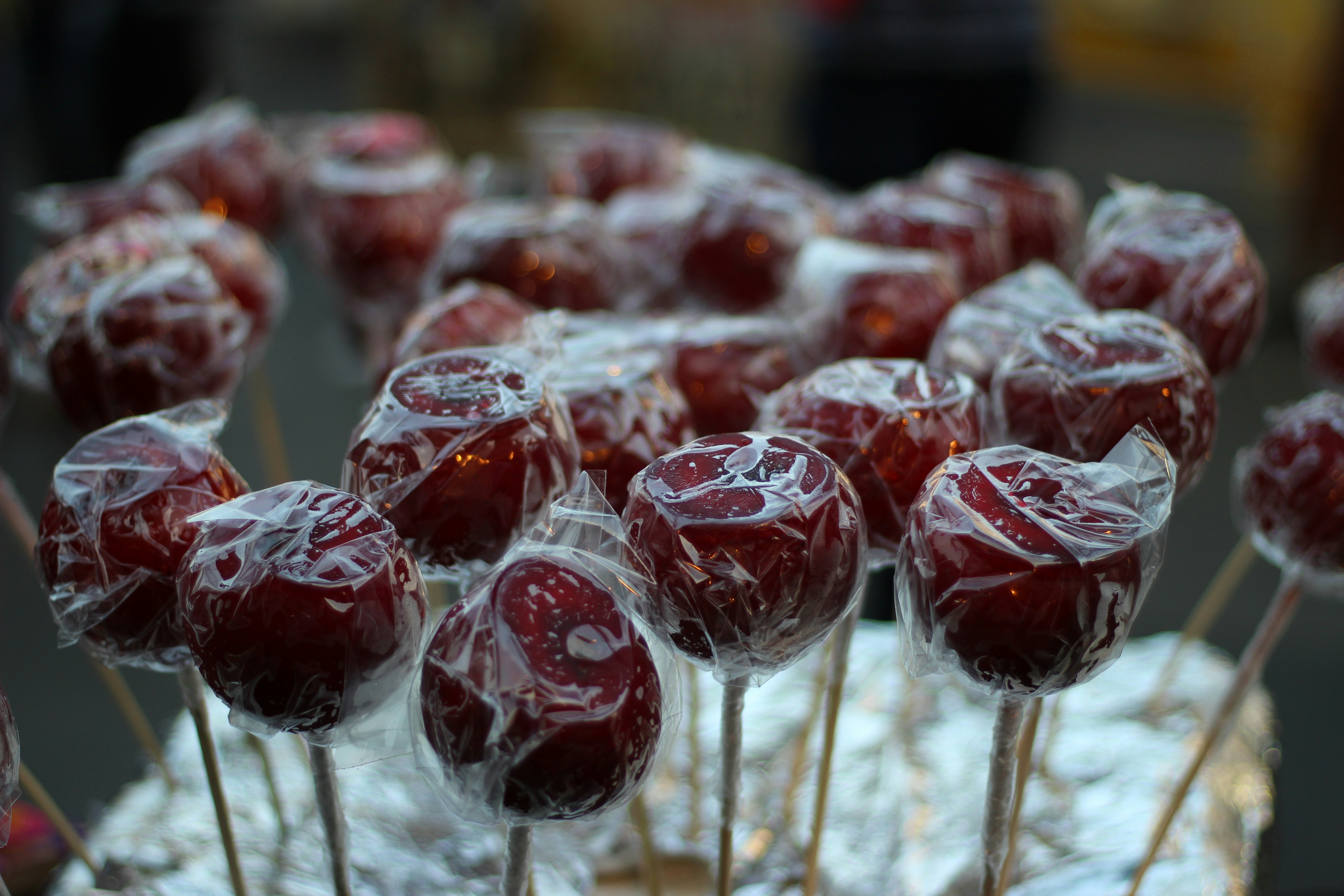 a bunch of candy lollipops sitting on top of a table