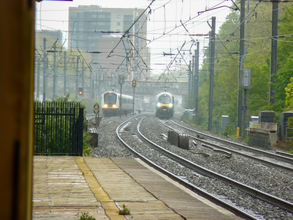 a couple of trains that are on some tracks