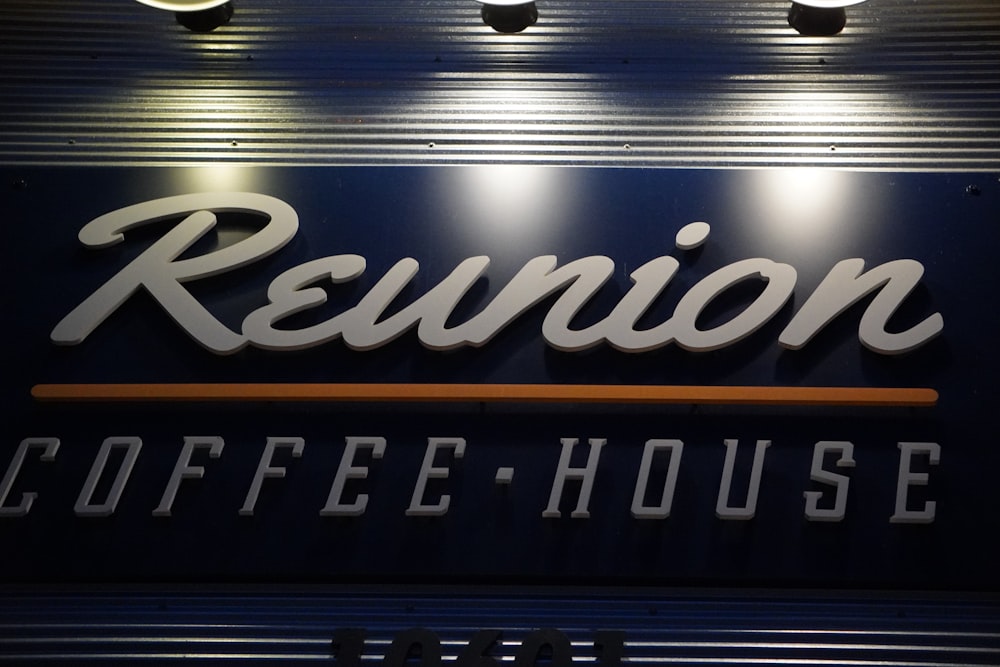 a sign that says reunion coffee house